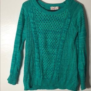 Green knitted sweater